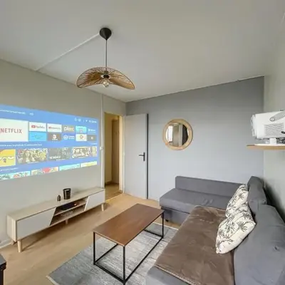 Cozy renovated apartment with cinema atmosphere and view