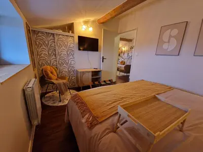 Un ou plusieurs lits dans un hébergement de l'établissement Suite Lodge