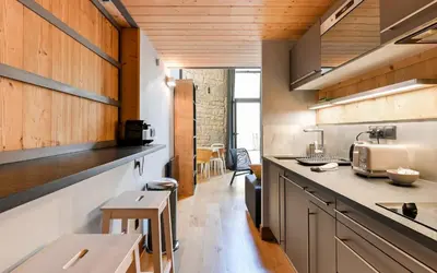 Cuisine ou kitchenette dans l'établissement Le petit Sully Foch