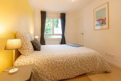 Un ou plusieurs lits dans un hébergement de l'établissement Appartement de standing - 4 chambres - Grand Lyon