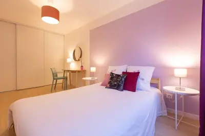 Un ou plusieurs lits dans un hébergement de l'établissement Appartement de standing - 4 chambres - Grand Lyon