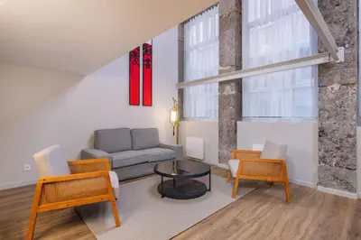 Coin salon dans l'établissement Appartement vue sur la Saône