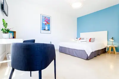 Un ou plusieurs lits dans un hébergement de l'établissement Cosy studio Lyon 1er Croix Rousse
