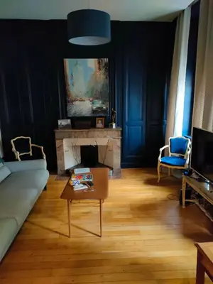 Coin salon dans l'établissement l elegante chambre chez moi