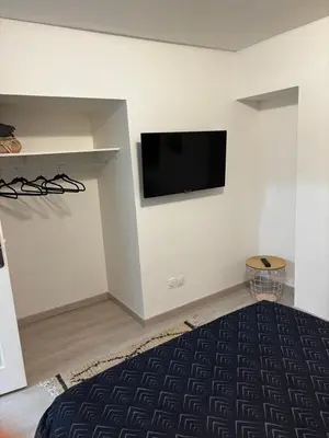 Télévision ou salle de divertissement dans l'établissement Charmant appartement 2 chambres