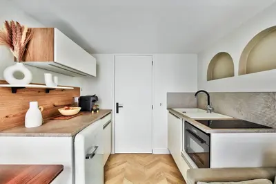 Cuisine ou kitchenette dans l'établissement Le Nid Suspendu