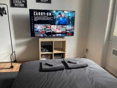 Un ou plusieurs lits dans un hébergement de l'établissement Studio Hôtel Villeurbanne Charpenne 3