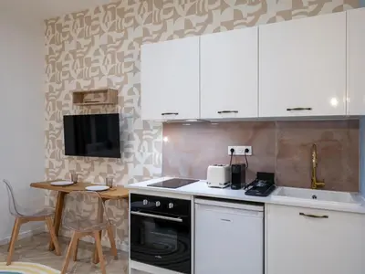 Cuisine ou kitchenette dans l'établissement Calm and design metro Guichard
