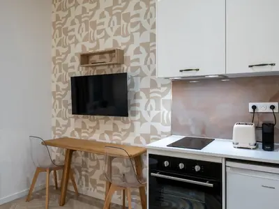 Cuisine ou kitchenette dans l'établissement Calm and design metro Guichard