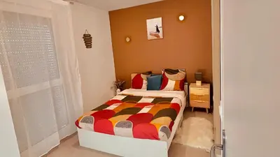 Un ou plusieurs lits dans un hébergement de l'établissement Chambre Privée chez Yérima