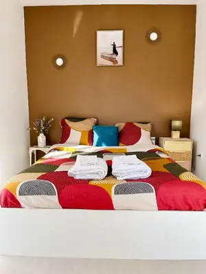 Un ou plusieurs lits dans un hébergement de l'établissement Chambre Privée chez Yérima
