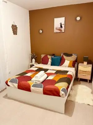 Un ou plusieurs lits dans un hébergement de l'établissement Chambre Privée chez Yérima