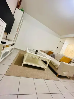 Télévision ou salle de divertissement dans l'établissement Chambre Privée chez Yérima