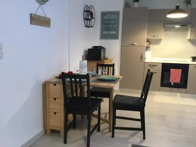 Cuisine ou kitchenette dans l'établissement Joli studio