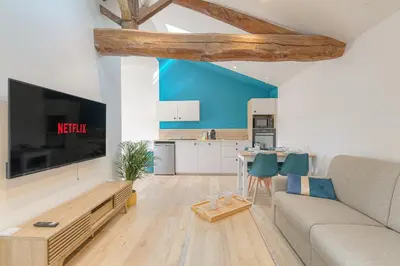 Télévision ou salle de divertissement dans l'établissement Wellin'Ars