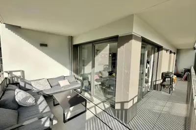 Coin salon dans l'établissement Superbe Appartement climatisé