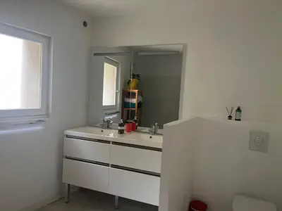 Salle de bains dans l'établissement Au Son du Clocher