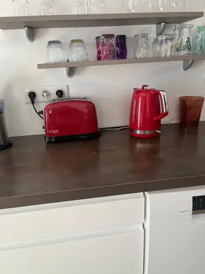 Cuisine ou kitchenette dans l'établissement Au Son du Clocher