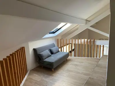 Coin salon dans l'établissement Le vermeil - demeure de charme avec spa - Borne de recharge électrique