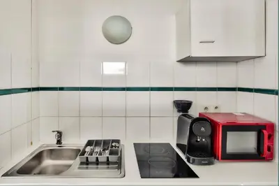 Cuisine ou kitchenette dans l'établissement O métro Jean jaures
