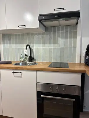Cuisine ou kitchenette dans l'établissement Le Charmant - Proche Gare