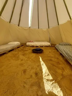 Un ou plusieurs lits dans un hébergement de l'établissement Tipi en pleine nature