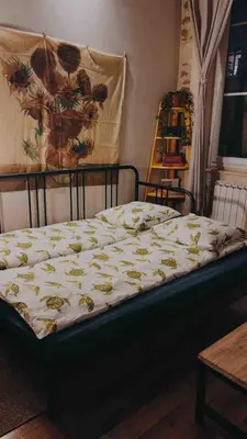 Un ou plusieurs lits dans un hébergement de l'établissement Cozy Loft City Center Croix-Rousse