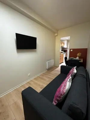 Télévision ou salle de divertissement dans l'établissement La Casa Cosy Duplex centre ville