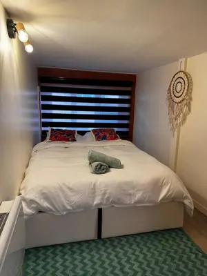 Un ou plusieurs lits dans un hébergement de l'établissement La Casa Cosy Duplex centre ville