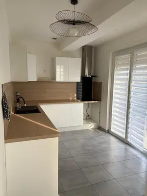 Cuisine ou kitchenette dans l'établissement T4 3 chambres canapé convertible 8 places