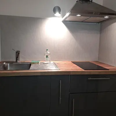 Cuisine ou kitchenette dans l'établissement L'Atelier Rochecardon