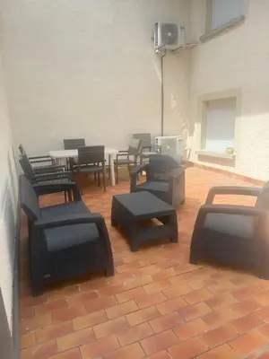 Coin salon dans l'établissement Saint Amour Appartement T2