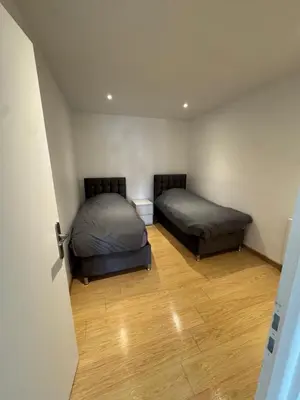 Un ou plusieurs lits dans un hébergement de l'établissement Appartement T3 rénové cœur de St Priest Parking Privé