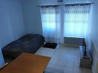 Un ou plusieurs lits dans un hébergement de l'établissement La petite maison du Charnay - Lantignie proximité Beaujeu