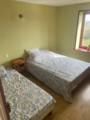 Un ou plusieurs lits dans un hébergement de l'établissement La petite maison du Charnay - Lantignie proximité Beaujeu