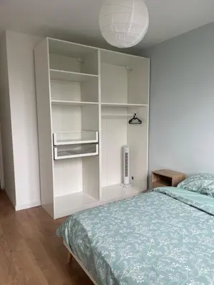 Un ou plusieurs lits dans un hébergement de l'établissement Logement spacieux et lumineux
