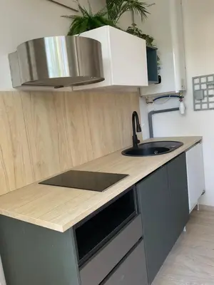 Cuisine ou kitchenette dans l'établissement Studio au cœur du village