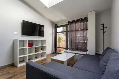 Télévision ou salle de divertissement dans l'établissement Smartstay Louis Mille - Gratte-Ciel