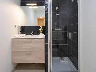 Salle de bains dans l'établissement Au Charme Lyonnais classé 3 etoiles