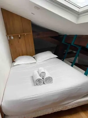 Un ou plusieurs lits dans un hébergement de l'établissement Esprit LOFT