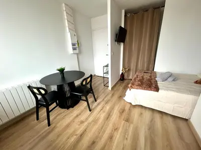 Un ou plusieurs lits dans un hébergement de l'établissement Le Cosy Urbain 100 m Gare