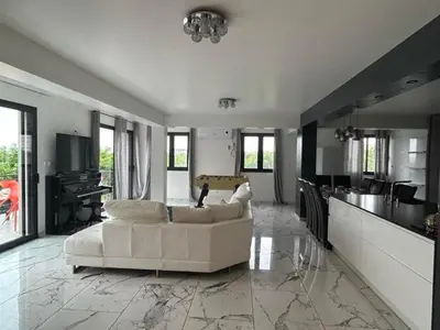 Coin salon dans l'établissement Belle Maison dans le Beaujolais