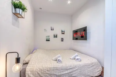 Un ou plusieurs lits dans un hébergement de l'établissement Studio Le Saphir NEUF & Cosy - Gare Parilly