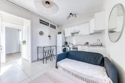 Cuisine ou kitchenette dans l'établissement T3 L'Étoile NEUF Cosy & Lumineux - Gare Parilly