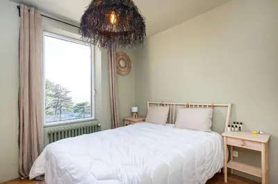 Un ou plusieurs lits dans un hébergement de l'établissement Ermitage - Magnificent Villa with Panoramic View Saint-Cyr-au-Mont-d'Or