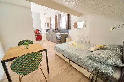 Un ou plusieurs lits dans un hébergement de l'établissement Salengro, Cosy Studio - Gauche
