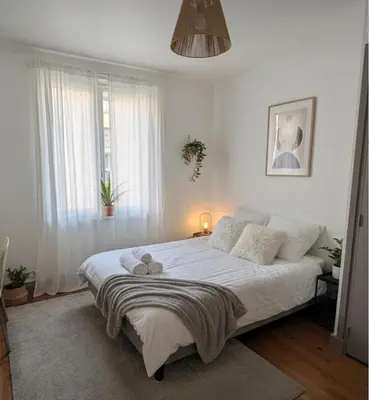 Un ou plusieurs lits dans un hébergement de l'établissement Chambre double chez l'habitant Oullins