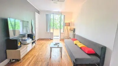 Télévision ou salle de divertissement dans l'établissement Chambre double chez l'habitant Oullins