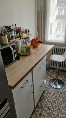 Cuisine ou kitchenette dans l'établissement Chambre double chez l'habitant Oullins
