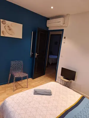 Un ou plusieurs lits dans un hébergement de l'établissement Chambre Noah chez Laurent
